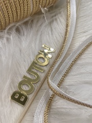 Кант плетеный золотистый с люрексом на белой основе