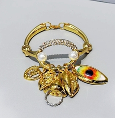 Браслет с подвесками в стиле Schiaparelli