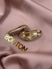 Пряжка-брошь неровной формы для купальника золотистая