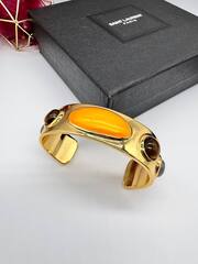 20989- Браслет жёсткий, латунь в лимонной позолоте YSL со вставками