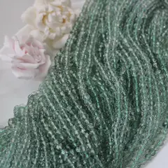 Бусины стеклянные серо-зелёные 