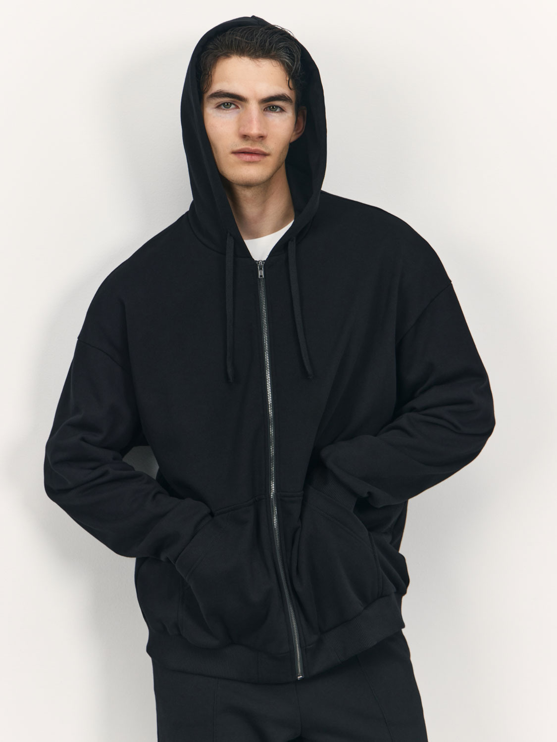 Quilted buttoned jacket Luga with a hood