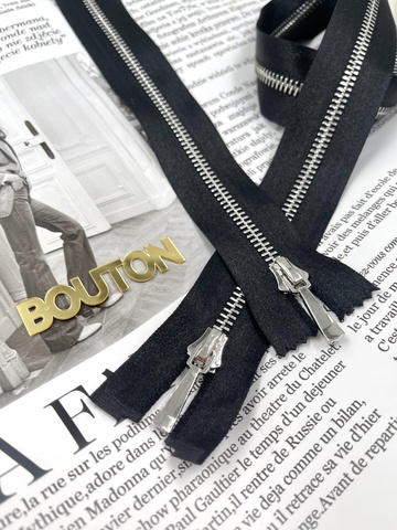 Молния на черной атласной тесьме серебристая