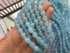 Нить бусин из тонированного кварца 8-9мм (галтовка)