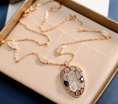 23935-Колье с подвеской голова Змеи с куб.цирконами rose VGOLD