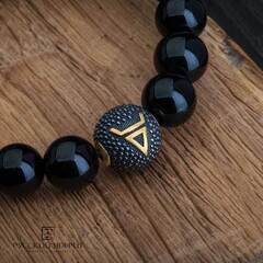 Бусина Велес из серебра с позолотой.