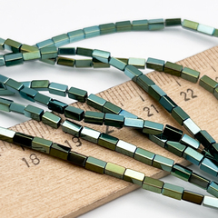 Гематит Брусок бусины (имитация), цвет зеленый, размер около 4*2 мм, цена за отрезок 19 см (1/2 нити)