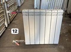 Биметаллический радиатор Б/У 500 7 секц. бок.