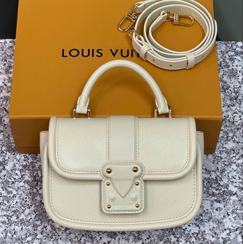 Сумка Louis Vuitton Hide And Seek кремовый