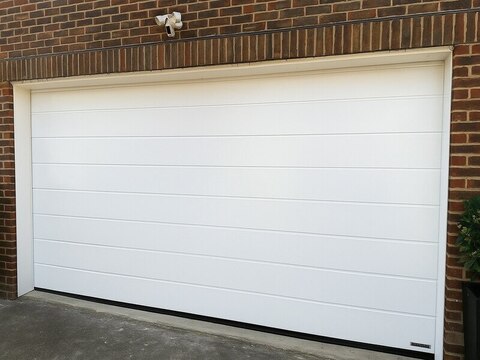 Гаражные секционные ворота Херманн/Hormann с приводом HyperMatic 800 BS на пружинах растяжения. LPU 42. *Разные размеры