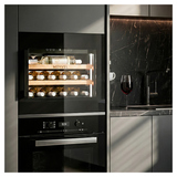 Винный шкаф MEYVEL MV19PRO-KBB1 49 л 592х572х455 мм сталь, черный