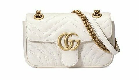 Стеганая мини-сумка Gucci GG Marmont белый