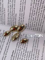 Пуговицы золотые овальные