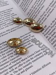 Пуговицы золотые овальные