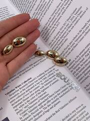 Пуговицы золотые овальные