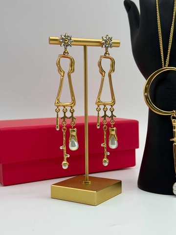 Серьги и кулон Schiaparelli