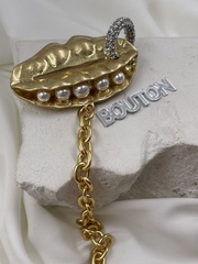 Брошь двойная Скиап. в золотом цвете жёлтый глаз и губы