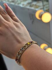 Браслет жесткий с цветными вставками CHANEL цвет шампань