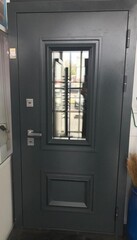 Входная уличная дверь с терморазрывом ПроТермо с багетом и стеклопакетом Букле графит/ Белый матовый ТМ Заводские двери