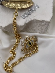 Брошь двойная Скиап. в золотом цвете жёлтый глаз и губы