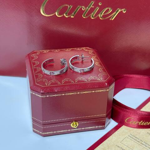 Серьги Cartier Agrafe