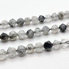 Кварц с шерлом крупной огранки бусины, размер около 5,5 мм, цена за 16 шт (1/4 нити)