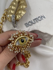 Брошь двойная Скиап. в золотом цвете жёлтый глаз и губы