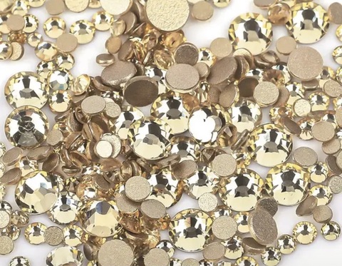 Стеклянные стразы  (размер микс) 1140шт, цвет  светлое золото