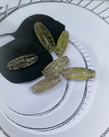 Бусина Дзи из ливийского стекла