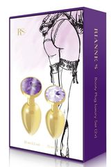 Набор из 2 золотистых анальных пробок с фиолетовыми кристаллами Booty Plug Original Luxury Set - 