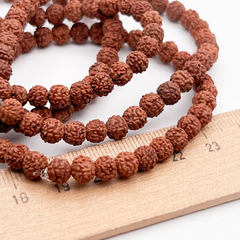 Рудракша бусины, размер около 5,7-6,1 мм, цена за 32-33 шт (1/2 нити)