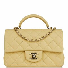 Стеганая мини-сумка Chanel с ручкой