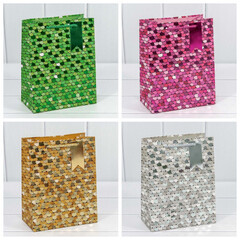 
          Пакет подарочный 18 х 23 х 10 см Набор 4 шт "Кружочки" с тиснением (Микс)