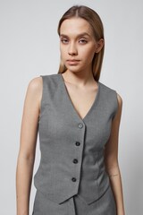 ЖИЛЕТ НА ПУГОВИЦАХ