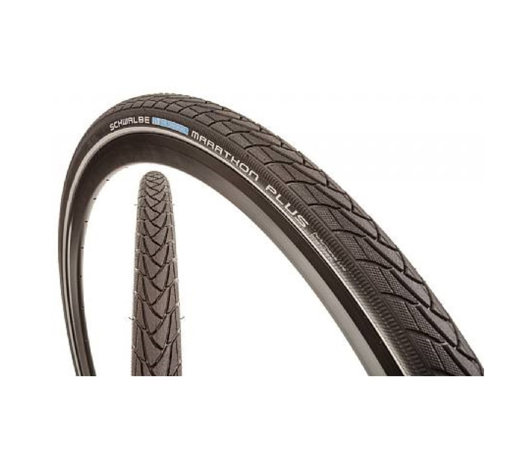 Покрышками marathon. Покрышка Schwalbe Marathon Plus. Schwalbe Marathon Plus 26. Schwalbe Plus покрышки 29. Schwalbe Marathon Plus 700x38c.