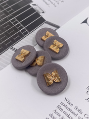 Пуговицы текстильные серые с золотом