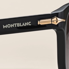 Солнцезащитные очки с черной оправой из ацетата