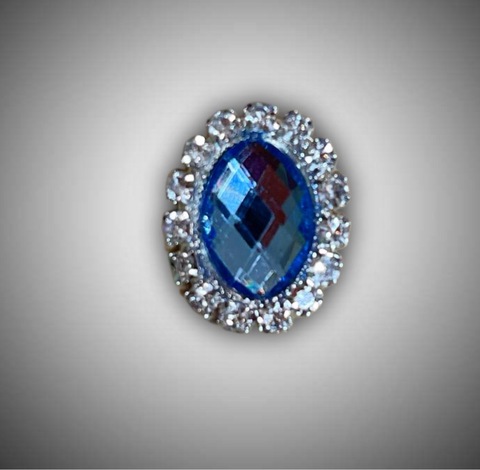 голубой  камень в оправе овал , в серебре, 2*1,5см