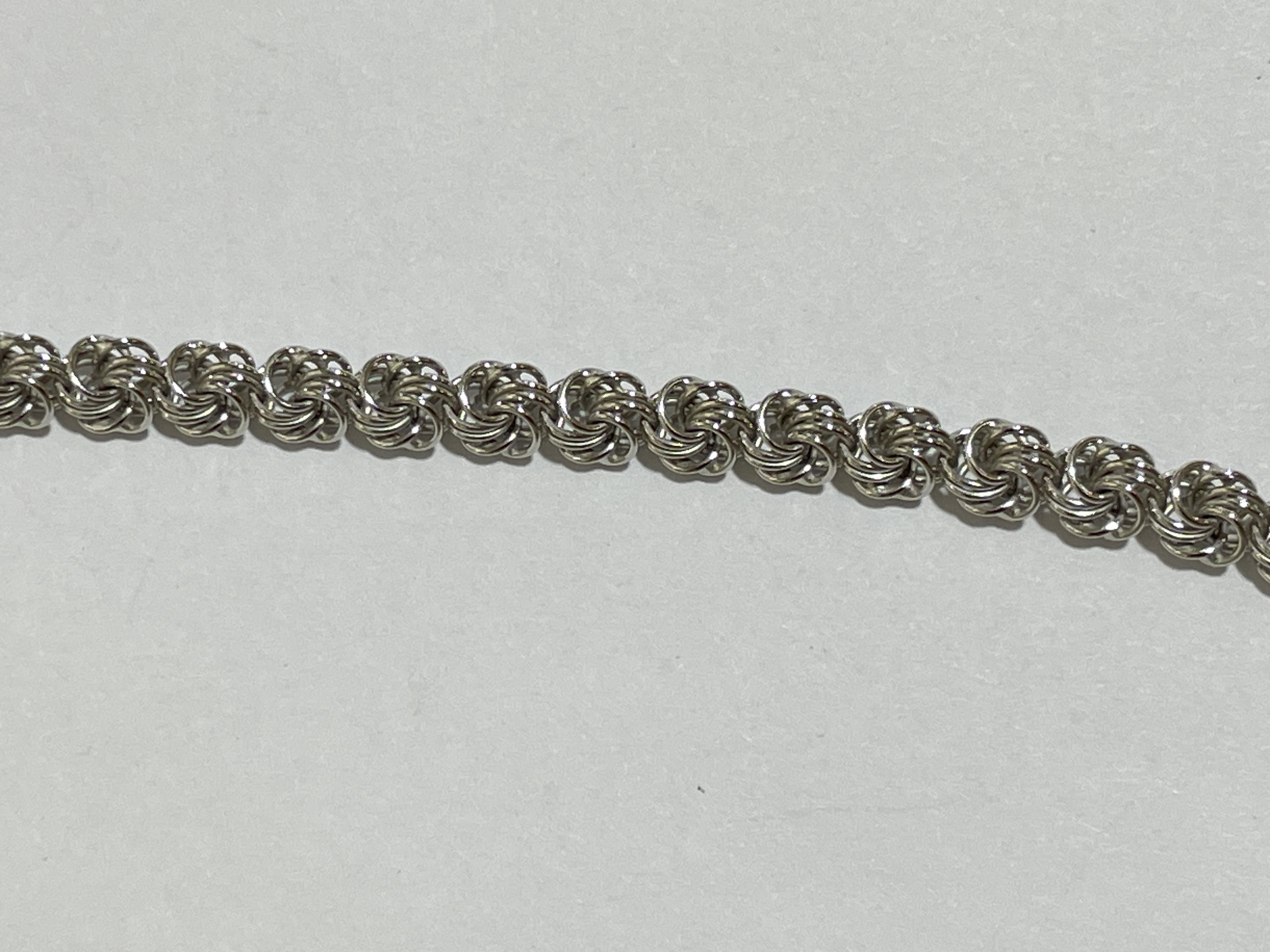 Розочка пустотелая 0,5   (серебряная цепочка)