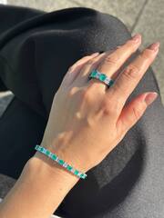 Теннисный браслет-дорожка из серебра 925 пробы с кварцами цвета параиба