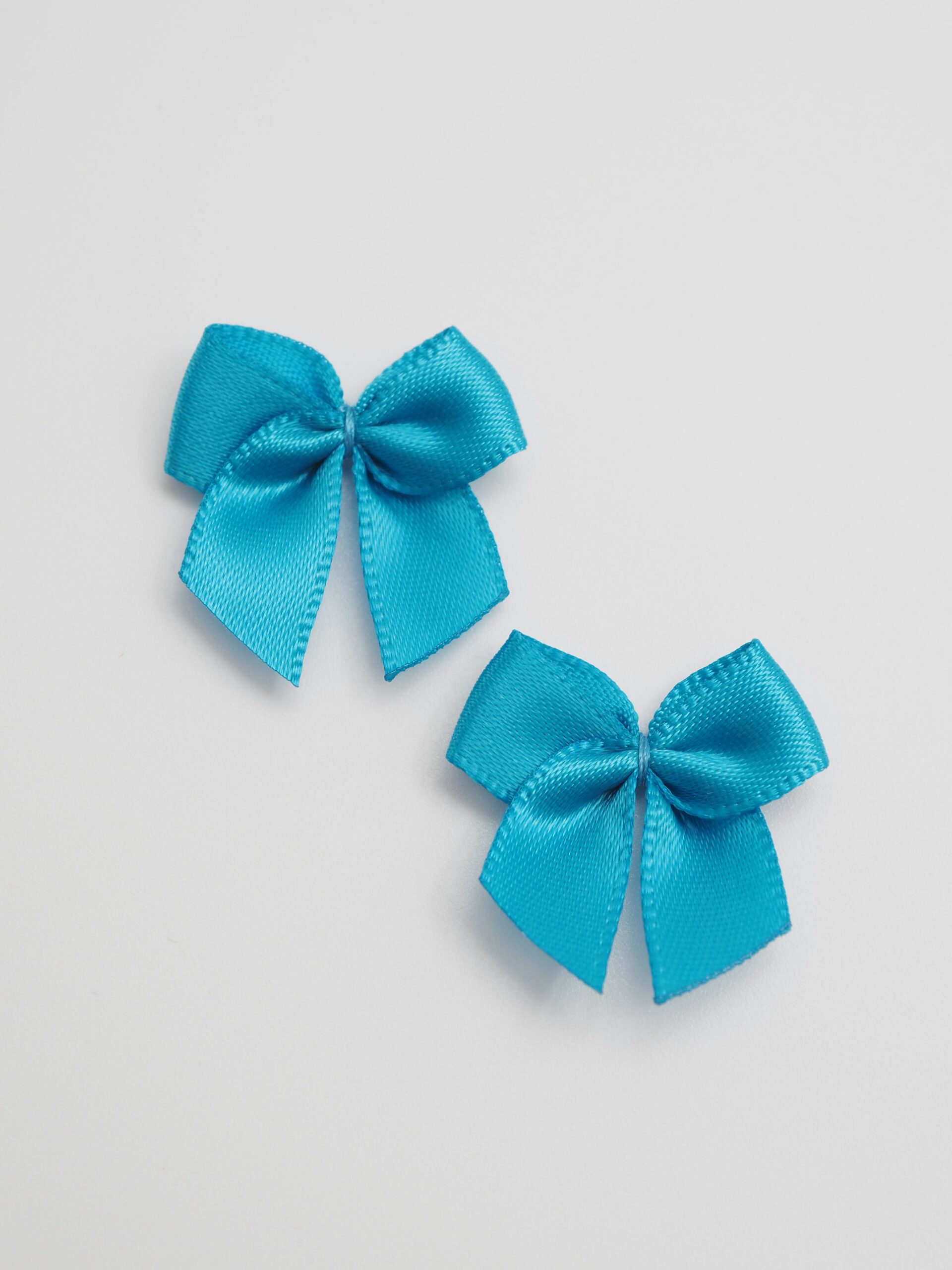 Бантик пришивной декоративный аква 2,5 см