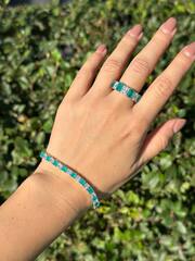 tennisnyj-braslet-dorozhka-iz-serebra-925-proby-s-kvarcami-cveta-paraib