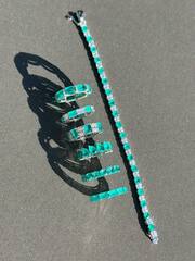 Теннисный браслет-дорожка из серебра 925 пробы с кварцами цвета параиба