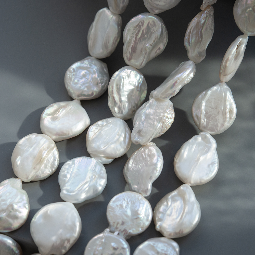 Жемчуг культивированный барочный в форме вытянутой монетки, белый, 19-22*15-17мм