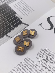 Пуговицы текстильные серые с золотом