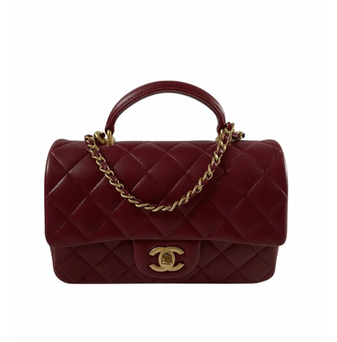 Стеганая сумка Chanel с ручкой