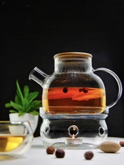 Заварочный чайник из стекла с подогревом от свечи