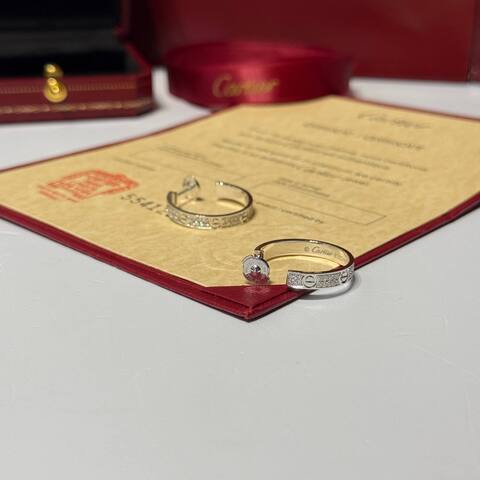 Серьги Cartier Agrafe