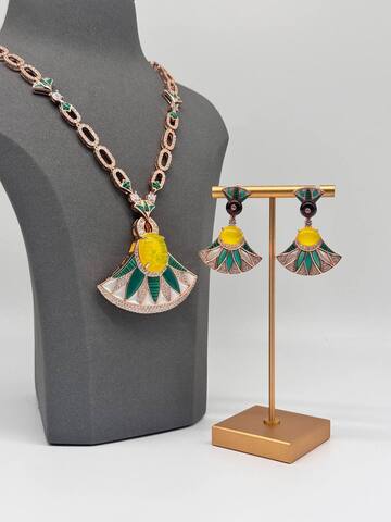 Комплект Bvlgari (кулон и серьги) в желтом цвете