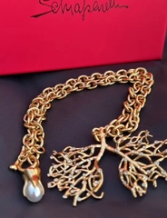 kole-vetki-dereva-v-stilistike-schiaparelli